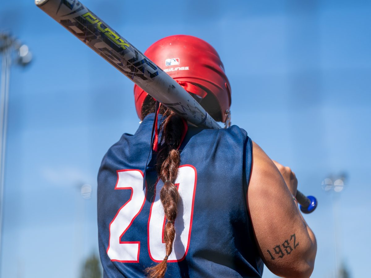Sophomore third baseman Gabby Schenone prepares to bat against San Joaquin Delta on the Bill Simoni softball field on Feb. 22 in Stockton, California.