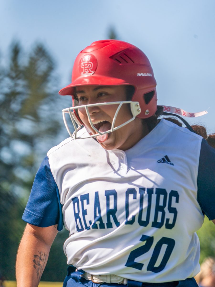 Sophomore third baseman Gabby Schenone is subbed out and celebrates towards the dugout after a single to right field sends freshman Kylee Baumann home for an RBI in the bottom of the fifth against Cosumnes River College on Sophomore Day on Tuesday, April 22 at home.