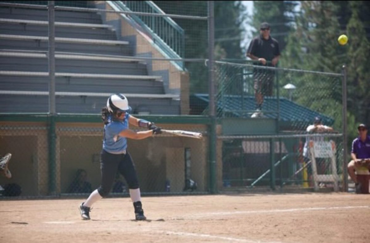 A young Gabby Schenone hits the ball during a travel ball tournament in 2018 in Tahoe, California.