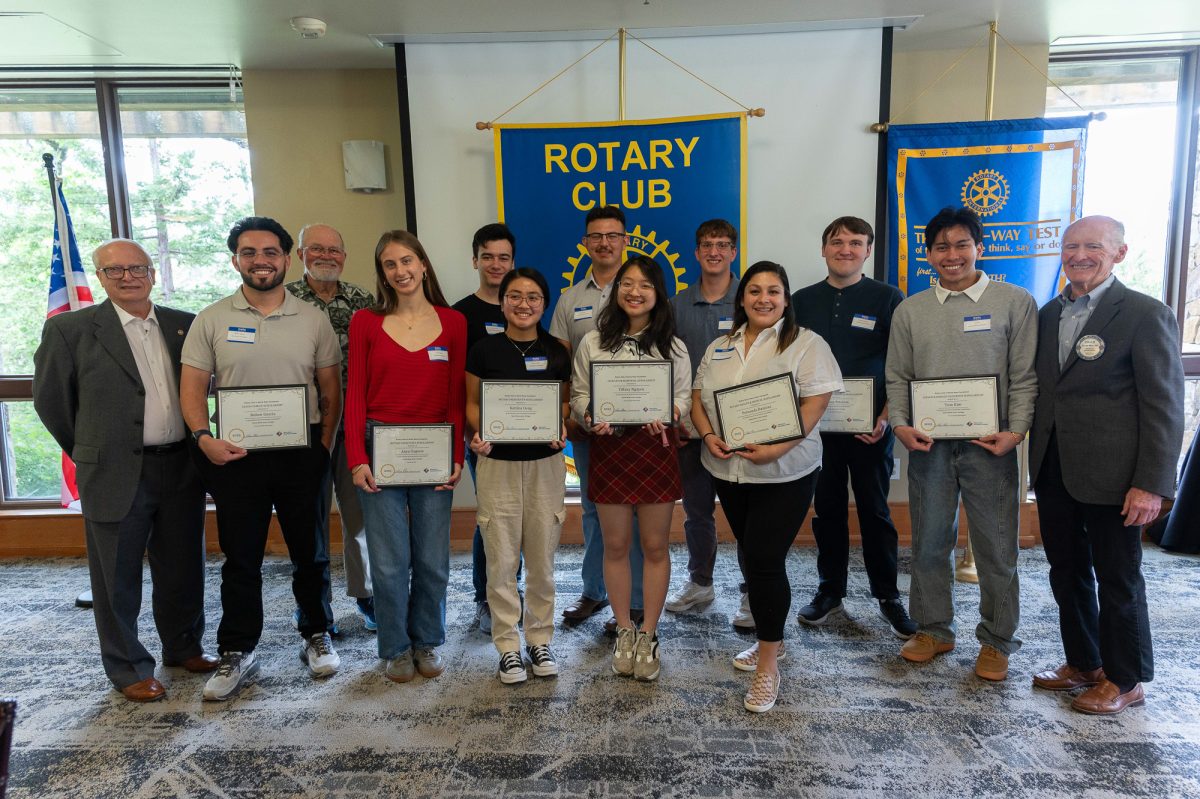 Rotary Club of Santa Rosa officials pose with recipients of RCSRF scholarships. (Left to right) Paul Hamilton, Ruben Garcia, Steve Olsen, Anya Agnon, James Schott, Katrina Gong, Daniel Rodriguez Orejon, Tiffany Nguyen, Nicholas Bartolomei, Fernanda Ramirez, Ashton Peterson, Tom Kim, Charles Were. Picture courtesy of Richard Rossi, RCSRF's photographer.