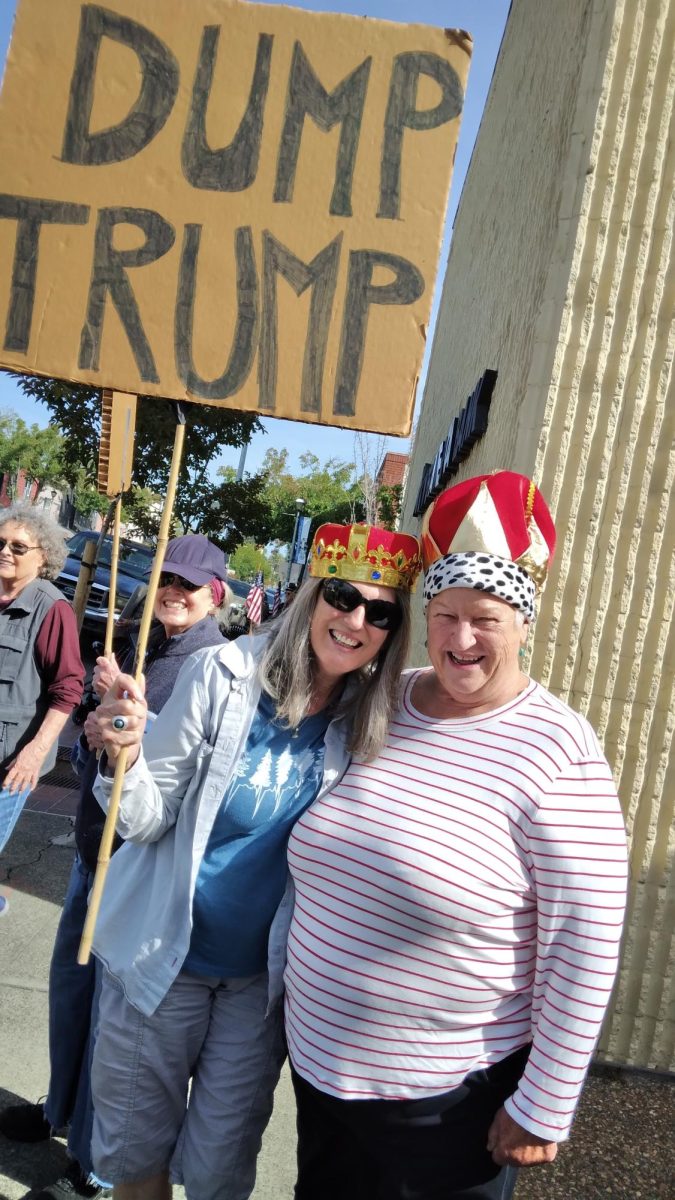 Mary Doan and Michele Lott of Prescott, AZ sporting their crowns at the No Kings protest in Sebastopol on June 14, 2025.