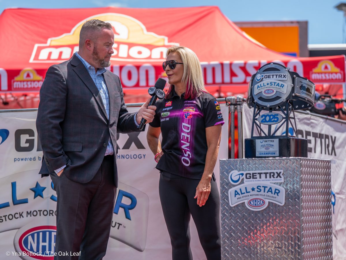 Announcer Brian Lohnes interviews Angie Smith during the GETTRX All Start Pro Stock Motorcycle Callout at the DENSO NHRA Sonoma Nationals on Friday, July 25, 2025 in Sonoma.