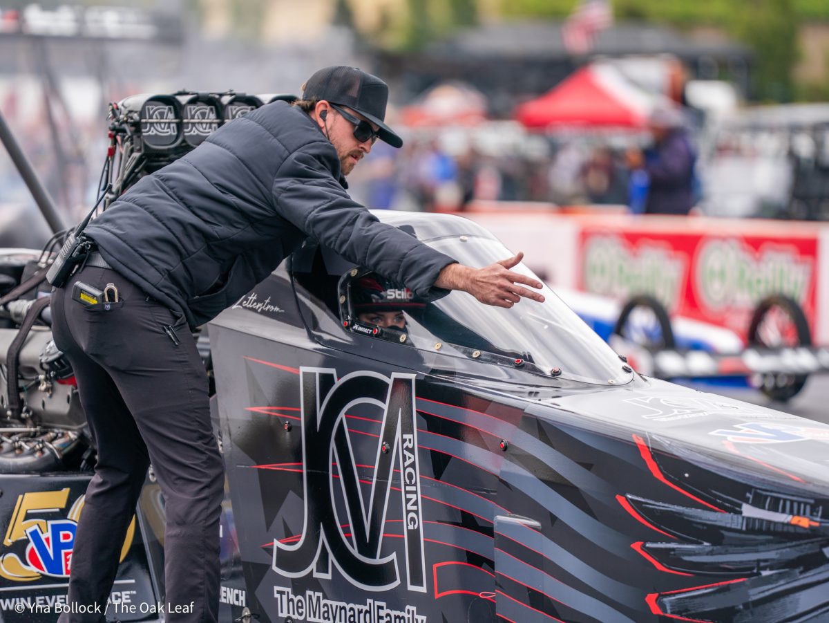 Ida Zetterstrom prepares for her Q3 run with a member of her crew on day two of the DENSO NHRA Sonoma Nationals on Saturday, July 26, 2025 in Sonoma.