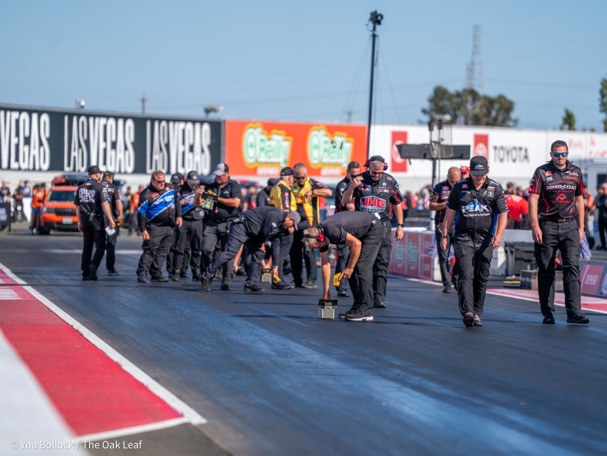 Multiple crews begin to make their assessments after a major track incident prior to the Q4 races on day two of the DENSO NHRA Sonoma Nationals on Saturday, July 26, 2025 in Sonoma.