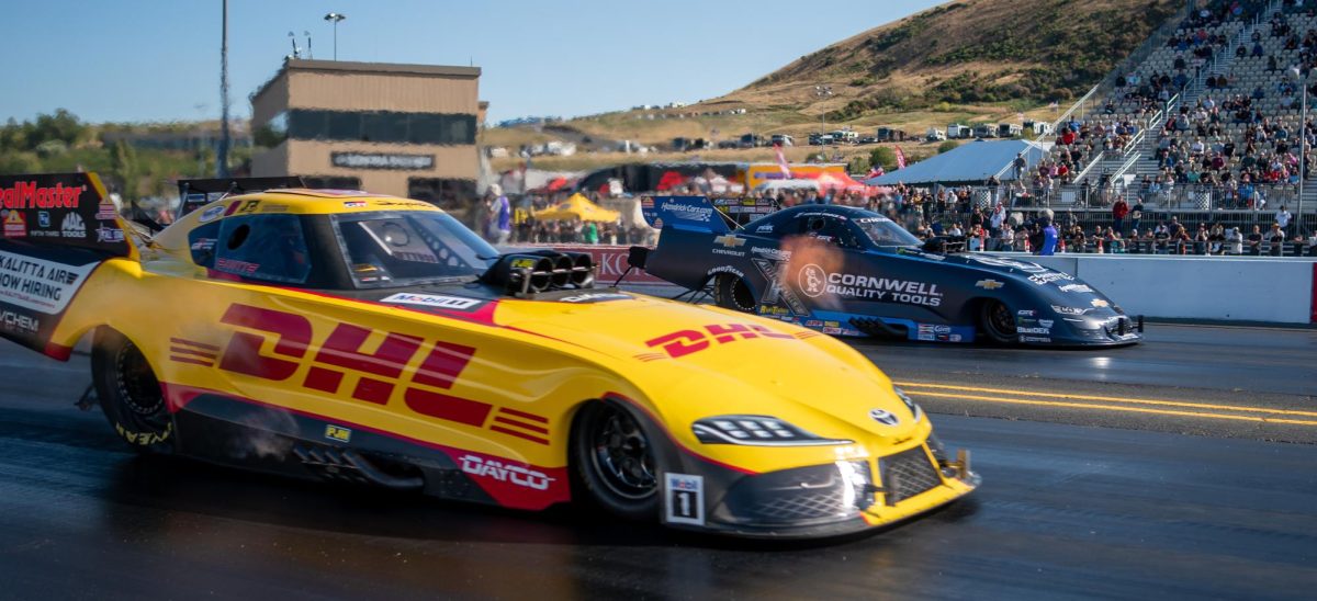 Funny Car driver JR Todd, left, races against Austin Prock in the fourth round of qualifiers at the DENSO NHRA Sonoma Nationals on Saturday, July 26, 2025 in Sonoma. 