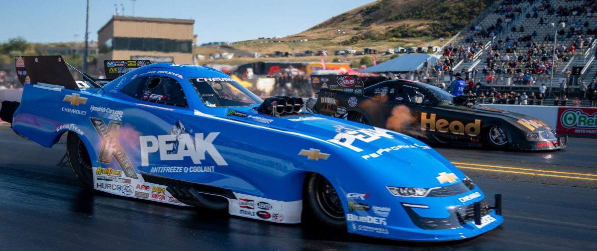 Funny Car driver “Fast Jack” Beckman, left, races against Spencer Hyde in the fourth round of qualifiers at the DENSO NHRA Sonoma Nationals on Saturday, July 26, 2025 in Sonoma. 