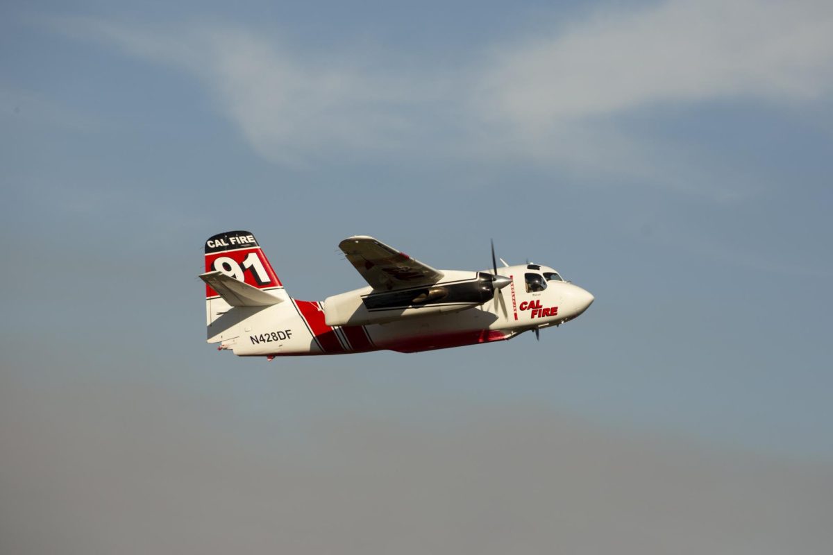 One of Cal Fire's S-2T airtankers departs Charles M. Schulz Sonoma County Airport to drop its payload on the Pickett Fire. This particular plane, 428DF, dropped eight loads of fire retardant between 4 p.m. and 8 p.m. before returning to Ukiah at 8:34 p.m. on Thursday, Aug. 21, 2025.