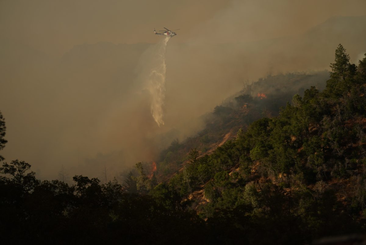 Cal Fire helicopters drop water on the fast growing Pickett Fire on Thursday, Aug. 21, 2025 in Calistoga, Calif.