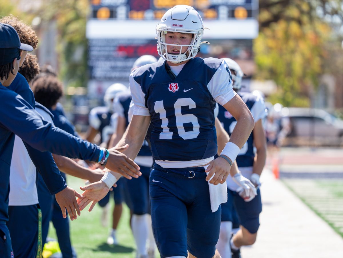 Quarterback Bobby McGovern runs down the sideline ahead of the game against San Jose City College on Saturday, Sept. 20 at home.