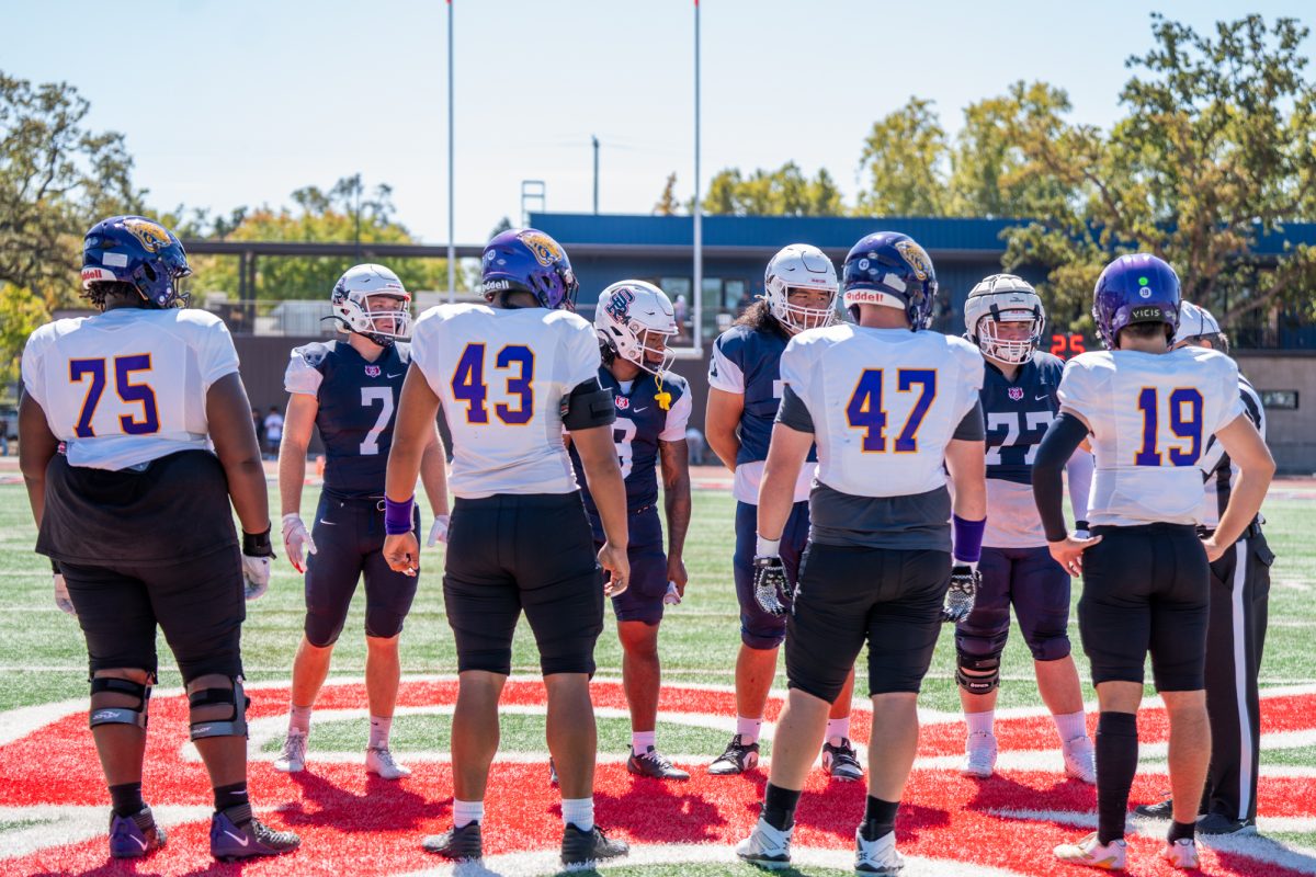 From left to right (back row): SRJC Captains Cayden Homan, Zion Williams, Xavier Uli and Caprice Coffey meet with the Jaguars captains at the 50-yard line ahead of the game against San Jose City College on Saturday, Sept. 20 at home.