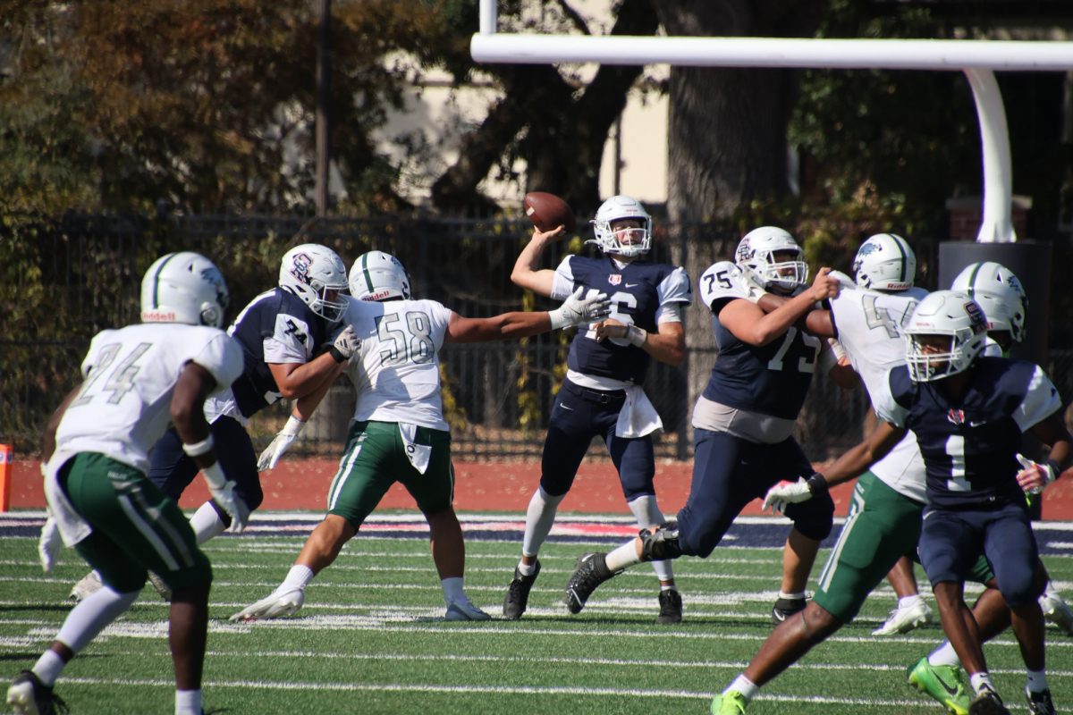  Quarterback Bobby McGovern looks and goes for the pass in the game against Laney on Saturday, Sept. 27, 2025. 
