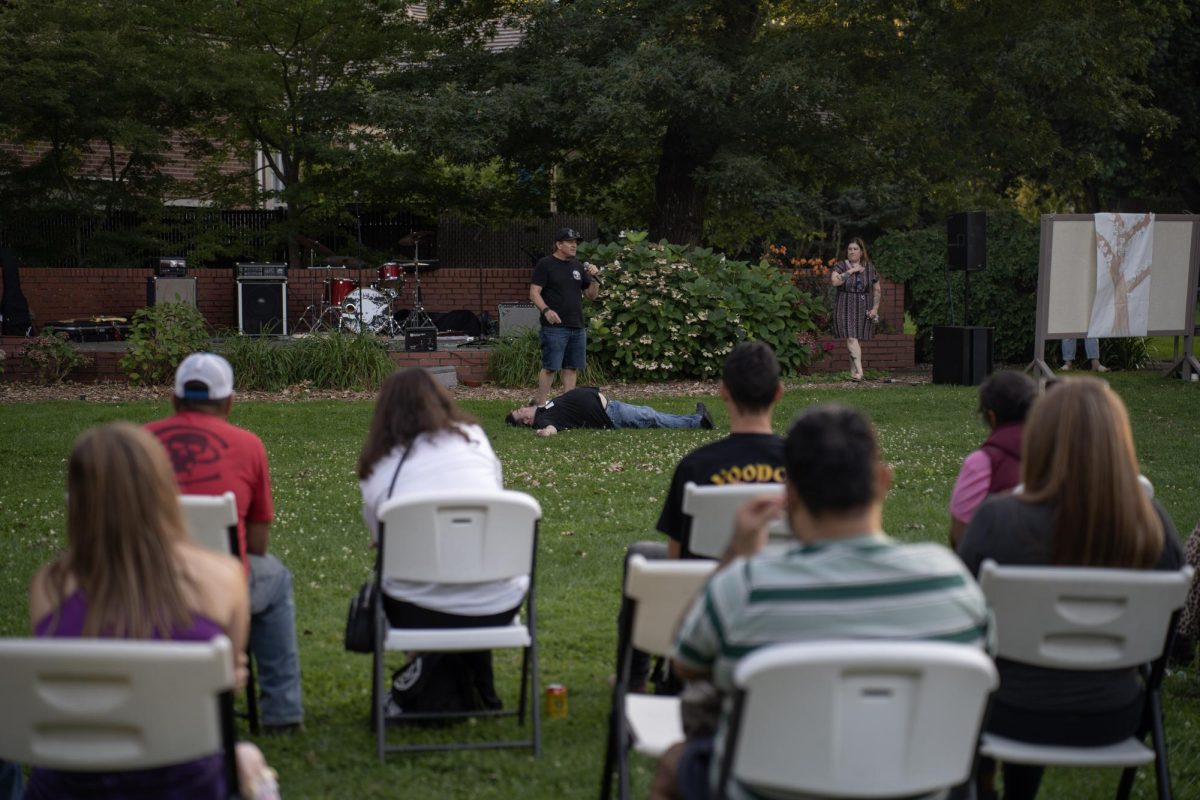 Dan Lionett, Students for Recovery president, demonstrated how to administer Narcan to a person who is experiencing opioid overdose with Kenny Hotchkiss, Students for Recovery treasurer, to Save the Youth attendees on the lawn outside SRJC’s Burbank Auditorium Aug 26. 
