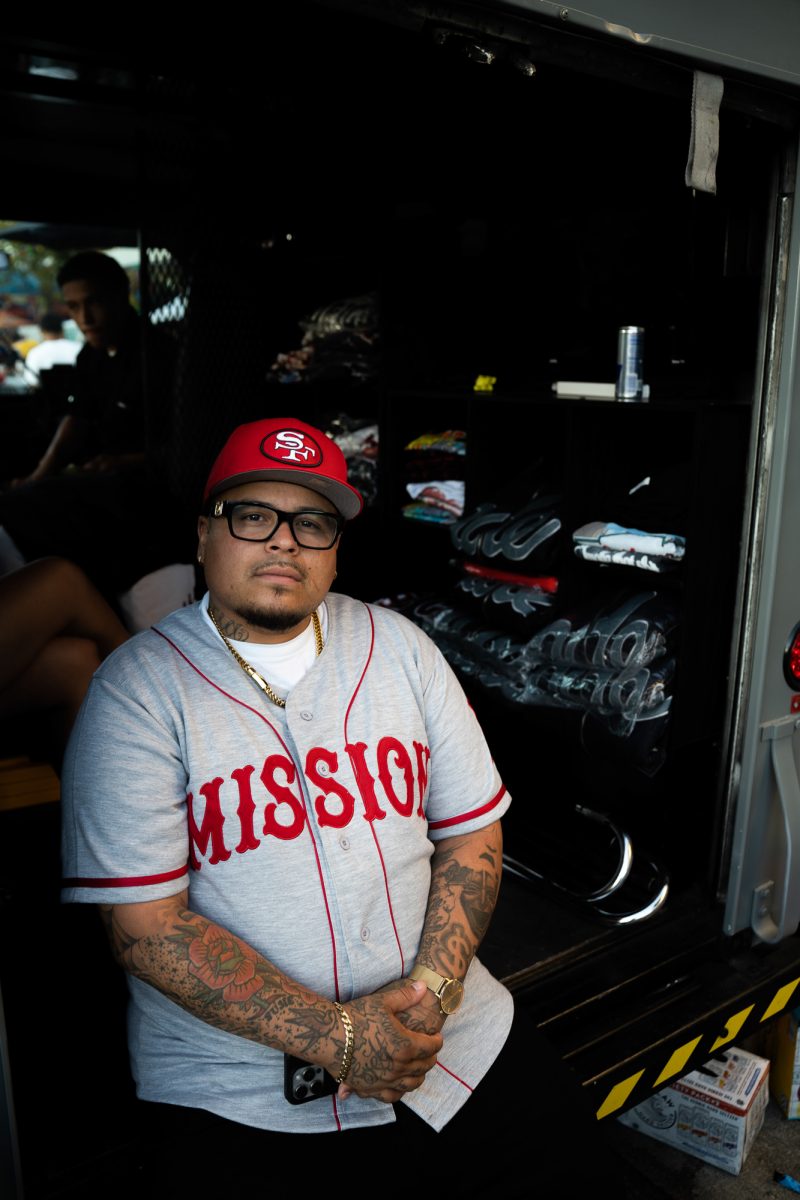 Joshua Marques poses for a photo, during the King of the Streets lowrider parade on 24th and Mission streets in San Francisco on Saturday, Sept. 20, 2025.