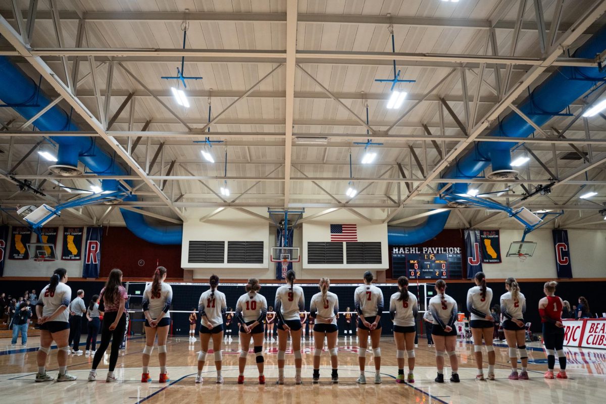 The Santa Rosa Junior College women's volleyball team lines up for the national anthem before their game against Hartnell College on Wednesday, Sept. 10, 2025.