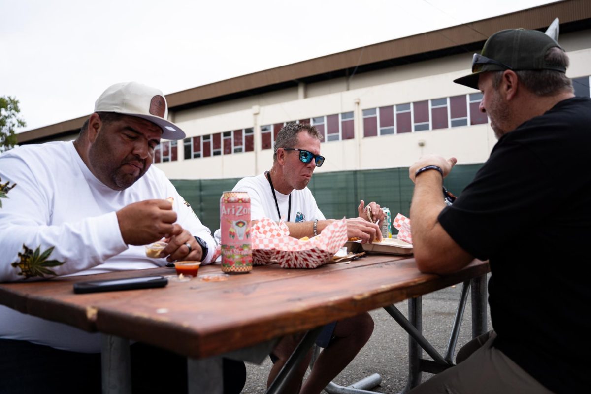 Attendees share a meal at Hall of Flowers in the Santa Rosa Fairgrounds on Wednesday, Sept. 10, 2025.
