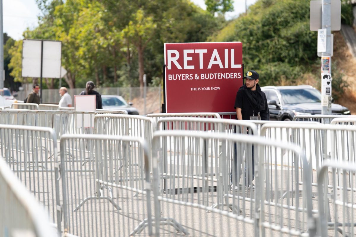 Hall of Flowers' staff standby to greet buyers and butenders into Hall of Flowers at the Santa Rosa Fairgrounds on Wednesday, Sept. 10, 2025.