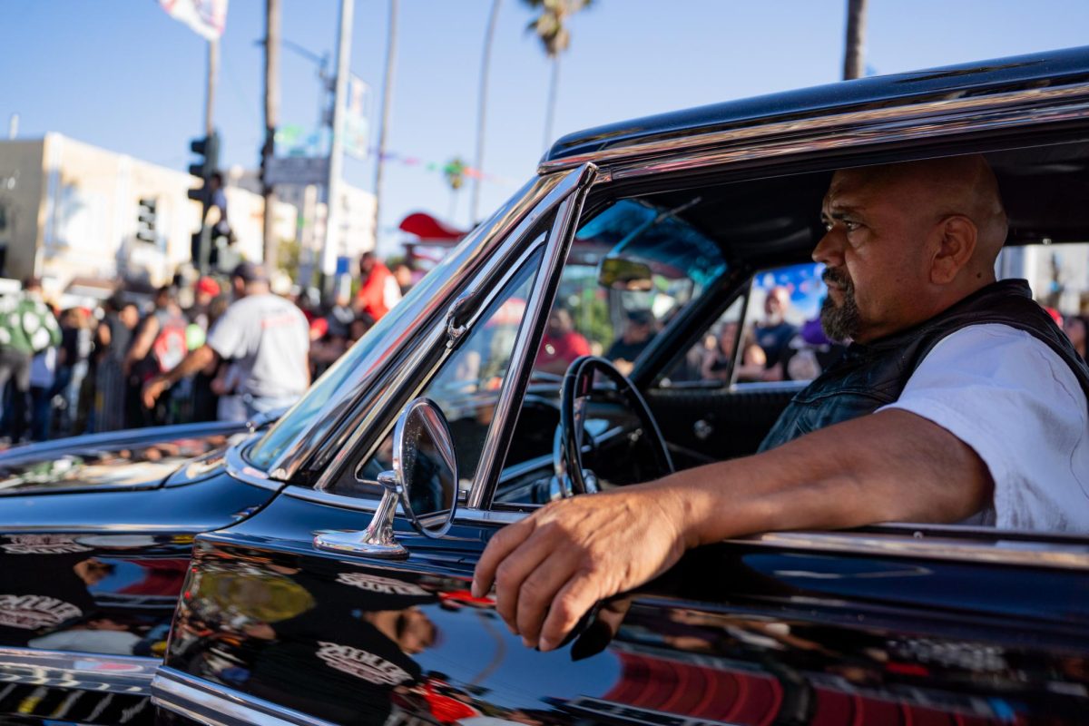 A Thrill of the Hop participant awaits their turn in the competition during the King of the Streets lowrider parade on 24th Street in San Francisco on Saturday, Sept. 20, 2025.