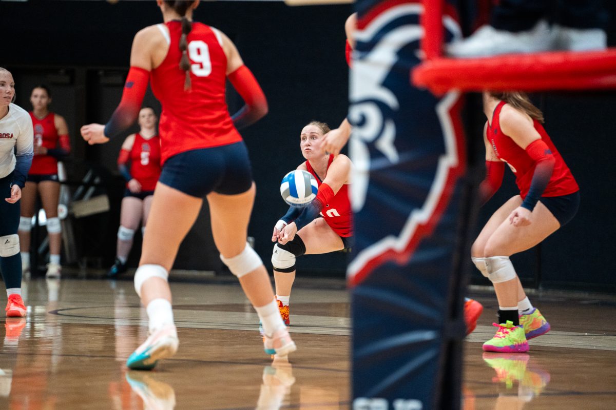 Santa Rosa defensive specialist Issa Mcininch drops for a dig against against San Mateo at Haehl Pavilion on Sept. 24, 2025.