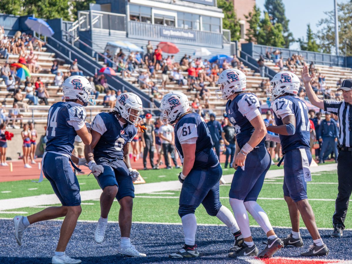 From left to right, Joseph Campbell, Zion Williams, Caden Harley, Bobby McGovern and Eli Evans meet Williams at the end zone after a 6-yard run ties the game 17-17 on Saturday, Sept. 27 at home.