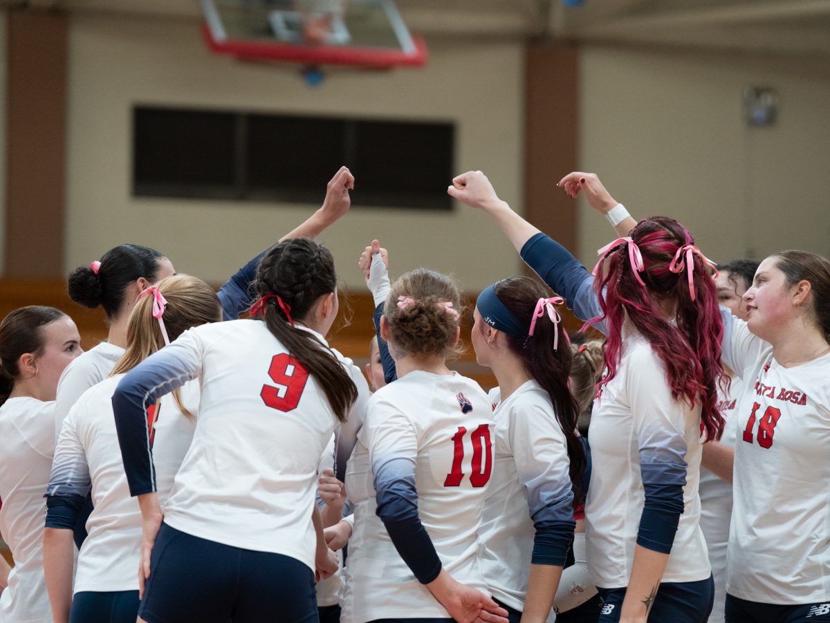 The SRJC women's volleyball team huddle and get ready for the game against American River College on Wednesday, Oct. 8 in Haehl Pavilion.