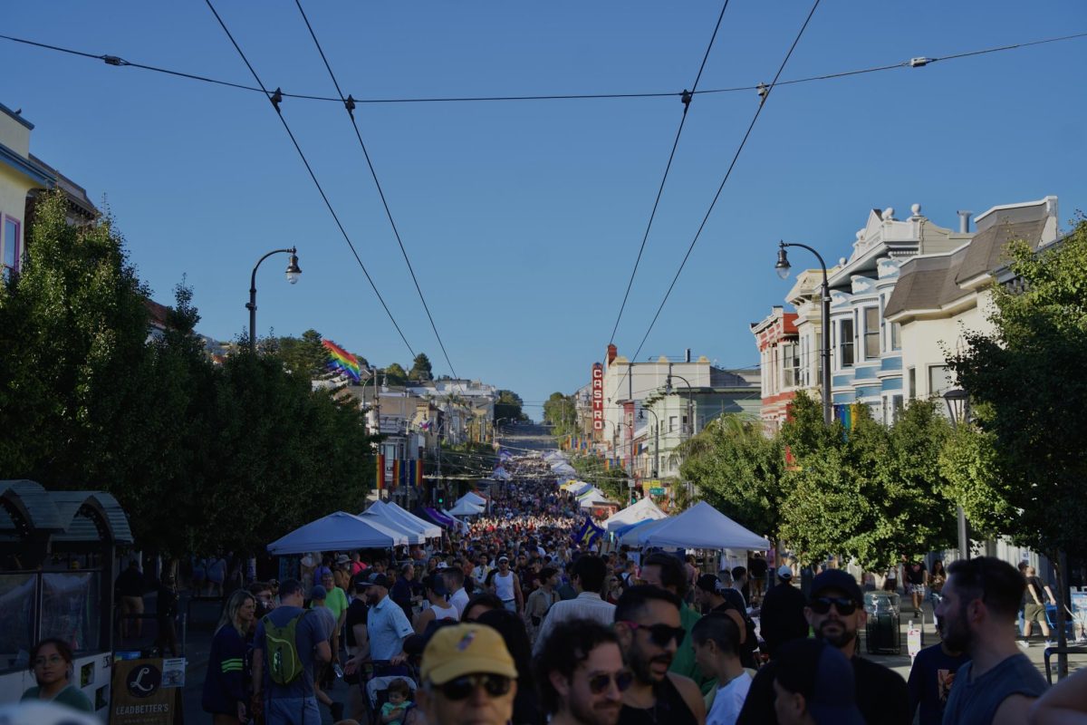 Thousands of people walk the streets of the Castro District during the neighborhood’s 51st annual Street Fair on Sunday Oct. 5, 2025. The fair celebrates decades of queer resistance by showcasing local artists, musicians and free social services through vendor booths, stage performances and more. 