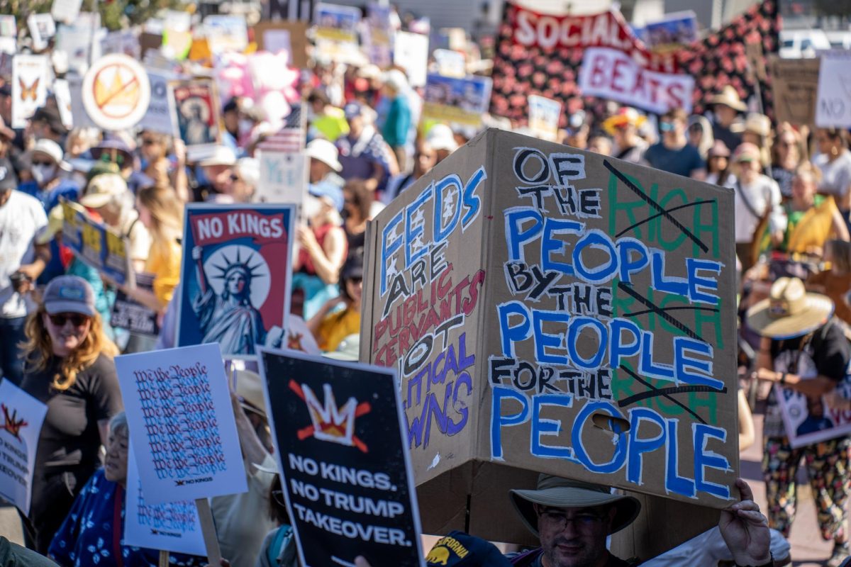 Demonstrators expressed their unrest with the Trump administration’s first year of leadership through a plethora of signs at a No Kings protest Saturday, Oct. 18, 2025 in Oakland, Calif. 