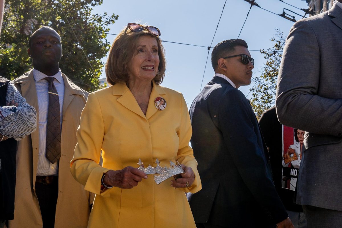 House of Representatives Speaker Emerita Nancy Pelosi (CA-11) holds a broken crown to show solidarity with protestors at a No Kings protest Saturday, Oct. 18, 2025 on Market Street in San Francisco, Calif. 
