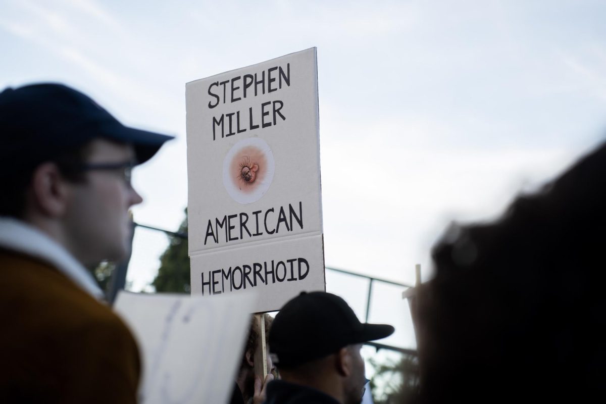 A demonstrator shows his feelings for Stephan Miller, United States Homeland Security Advisor, at a protest on Thursday, Oct. 23 in San Francisco, Calif. 
