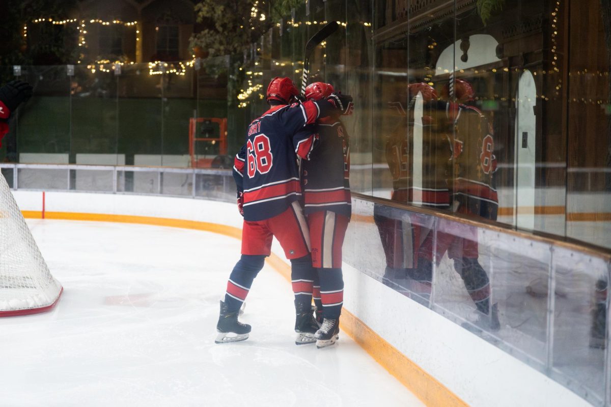 Polar Bears center Adam Berry, left, embraces captain Kai Krombholz. right, after Krombholz scores against Santa Clara University on Saturday, Oct. 4, 2025 at Snoopy's Home Ice.