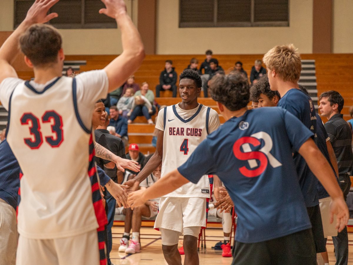 SRJC sophomore forward Dave Baraka leads the line up off during pre-game announcements against Napa Valley College on Tuesday, Nov. 11 at home.
