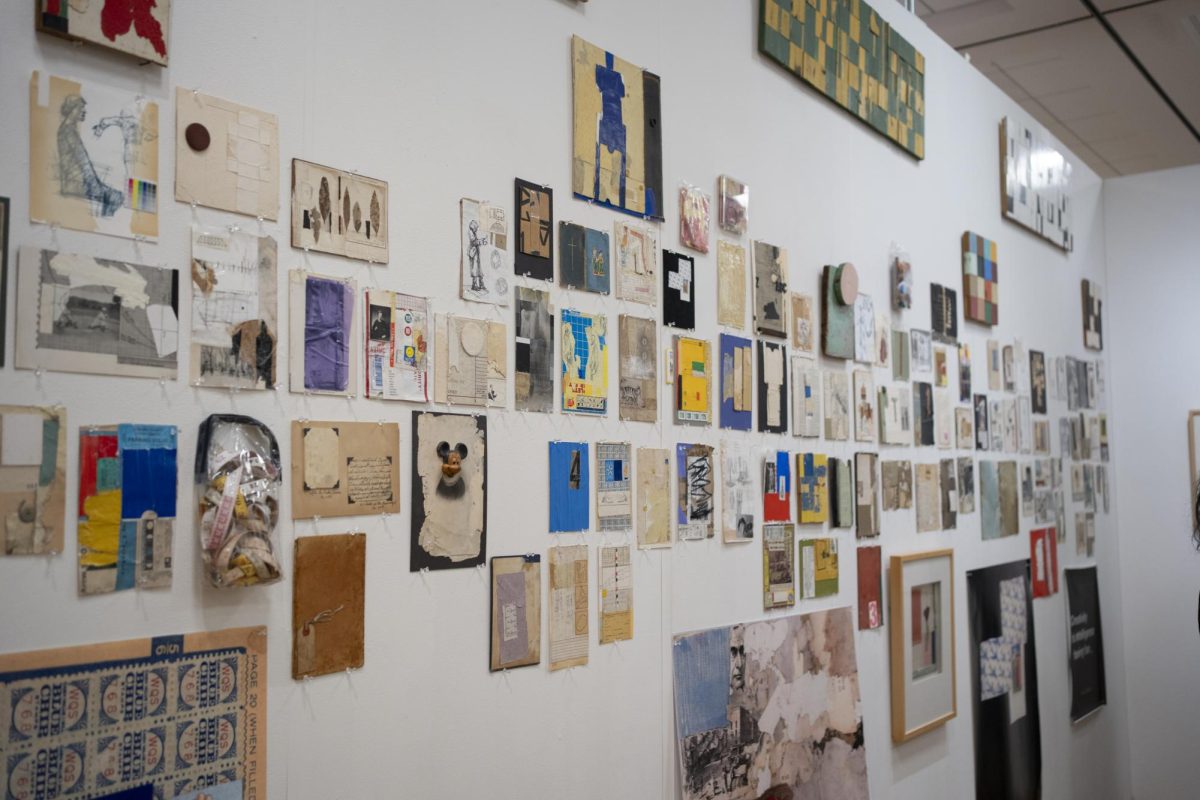 Various collages and multimedia pieces cover a wall of Alan Azhderian's "Content/Content" exhibition during the closing reception on Dec. 4 at the Robert F. Agrella Gallery.