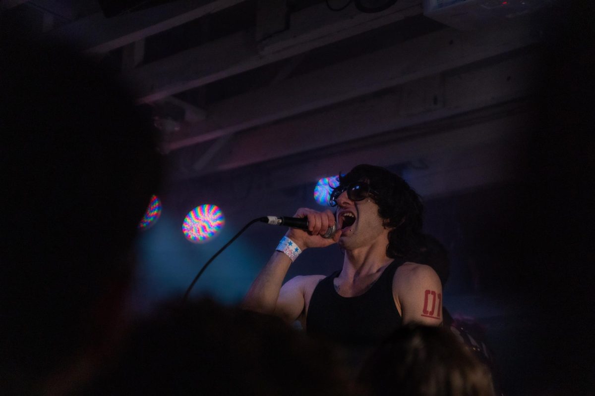 More than 100 adoring fans share myspacemark's passion as he sings his heart out during his first performance Dec. 4, 2025 at the DNA Lounge in San Francisco.