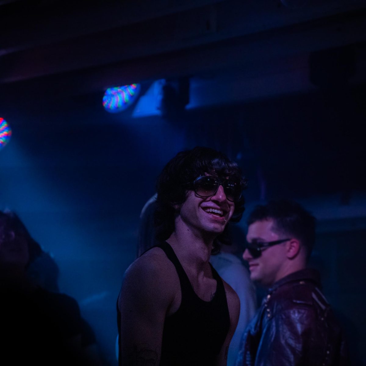myspacemark smiles as the audience sings his own lyrics back to him Dec. 4, 2025 at the DNA Lounge in San Francisco. 