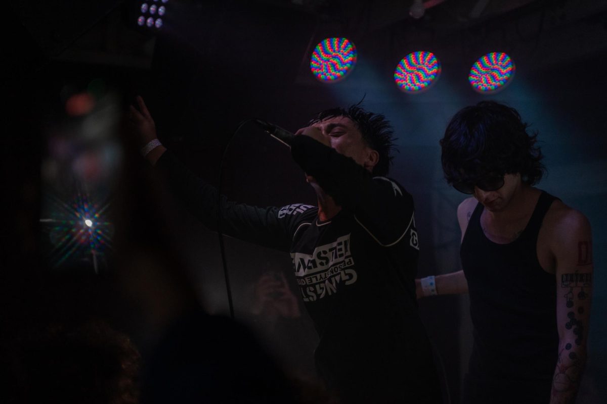 nastynovocaine (aka Jordan Narra, left) joins myspacemark (right) on stage to perform his own music for an audience for the first time Dec. 4, 2025 at the DNA Lounge in San Francisco. 