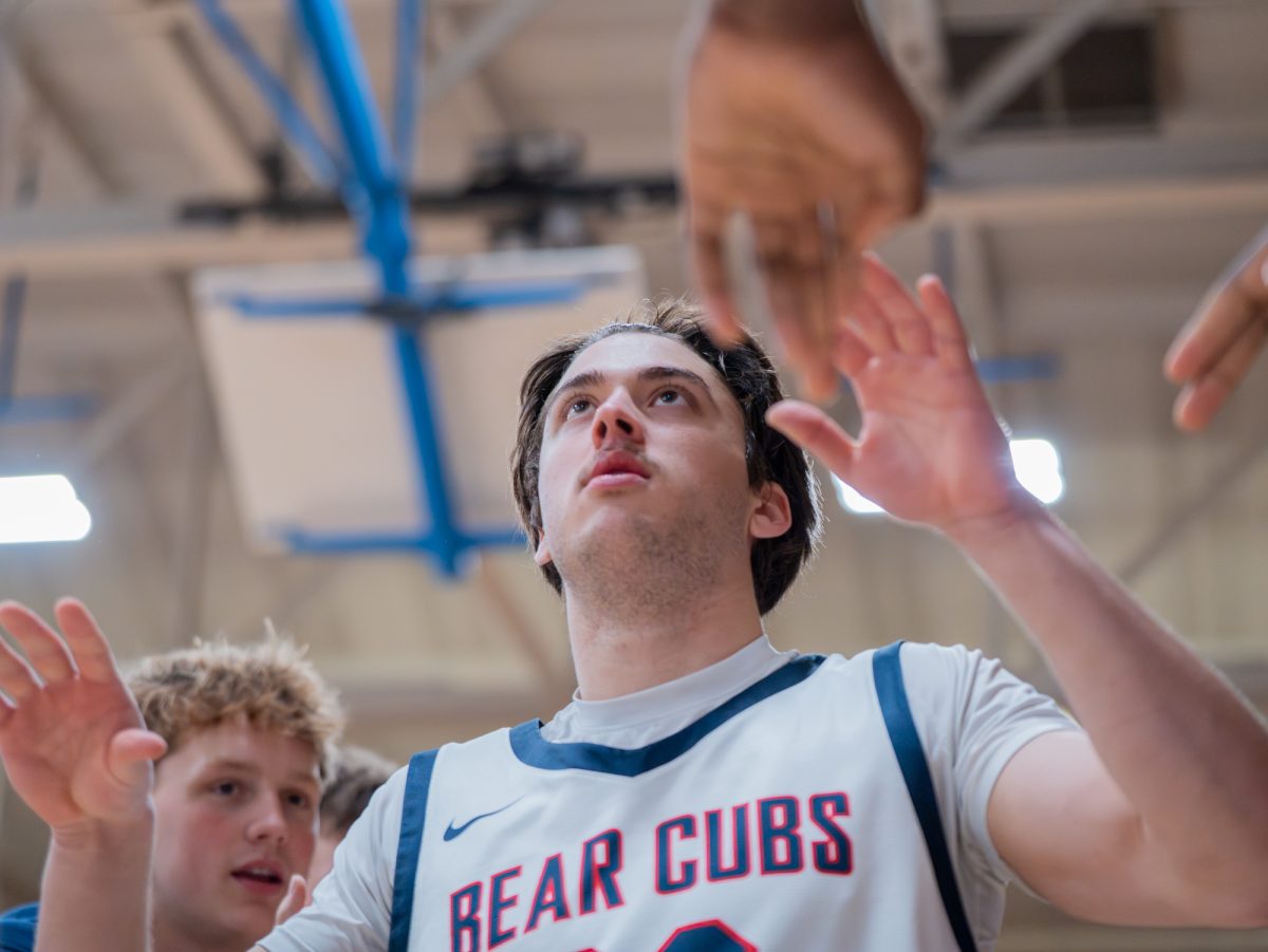 Sophomore forward Audon Forgus walks onto the court as he is introduced overhead for the Bear Cubs' matchup against Diablo Valley College on Friday, Jan. 30 at home.