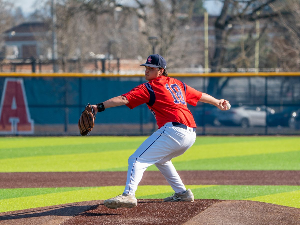 Sophomore starting pitcher Wyatt Abramson winds back for a pitch against Cañada College on Friday, Feb. 6 at home.