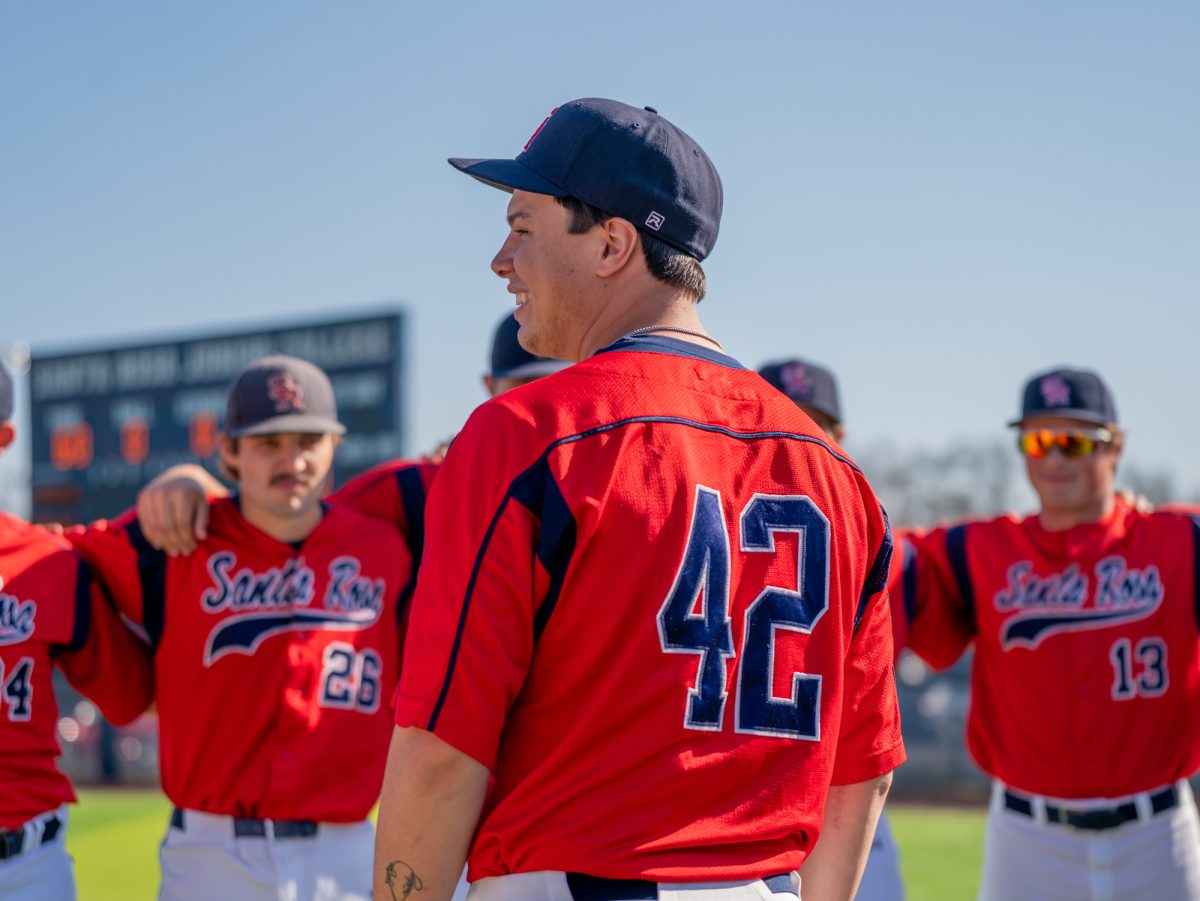 Sophomore Will Gumbrell gathers the team for the pre-game huddle ahead of the game against Cañada College on Friday, Feb. 6 at home.