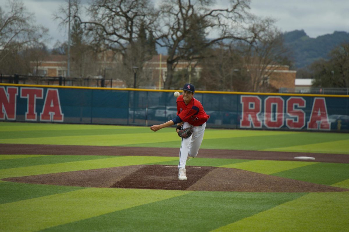 Bear Cubs pitcher warms up before his start against College of Marin on Saturday, Feb. 14 at home. (Oliver Kindt / For The Oak Leaf)