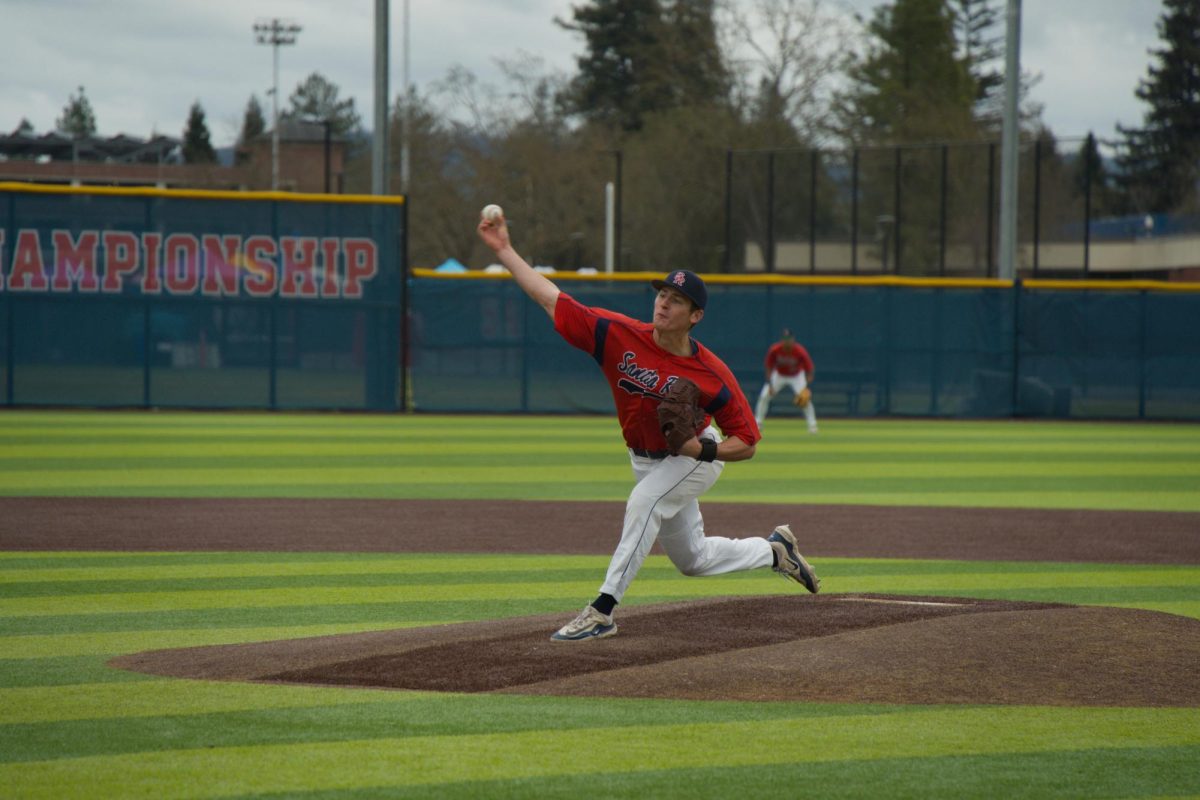 Bear Cubs pitcher Elijah Hackathorn delivers against College of Marin on Saturday, Feb. 14 at home. (Oliver Kindt / For The Oak Leaf)