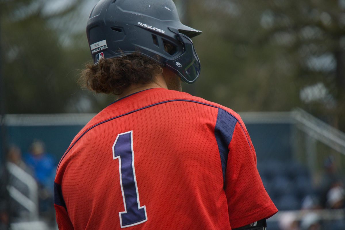 Bear Cubs centerfielder Cooper Wood scopes out the College of Marin pitcher on Saturday, Feb. 14 at home. (Oliver Kindt / For The Oak Leaf)