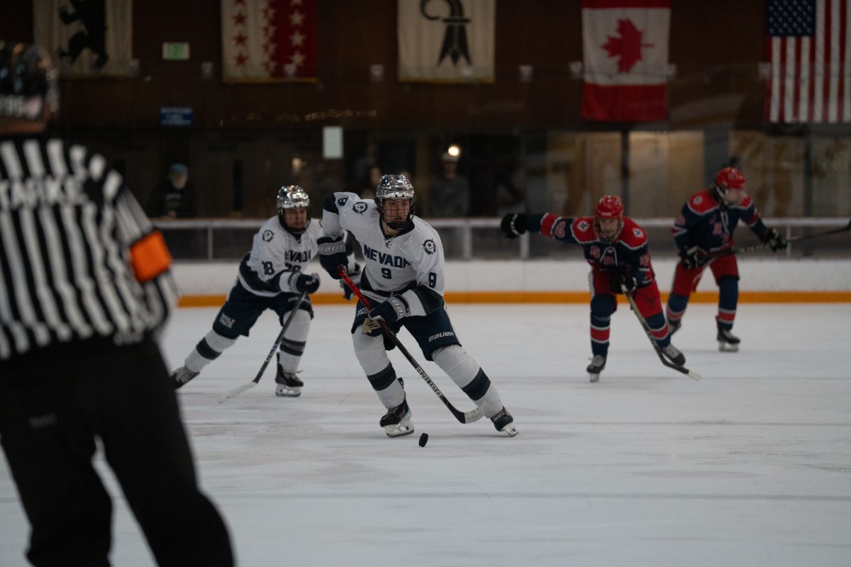 Wolfpack forward Jack Eber races down the ice for an odd-man rush Friday, Feb. 6 at Snoopy's Home Ice.