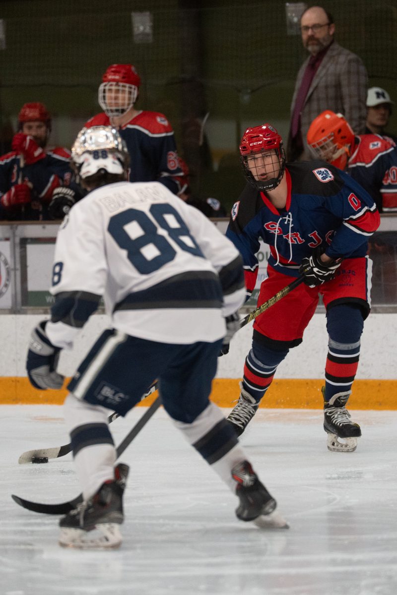 Polar Bears defenseman August Heinze looks for an opening Friday, Feb. 6 at Snoopy's Home Ice.