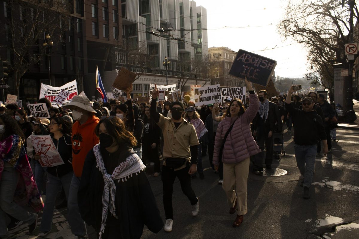 Protesters march and chant their way to San Francisco City Hall from Market Street during the ICE Out march Friday, Jan. 30, 2026.