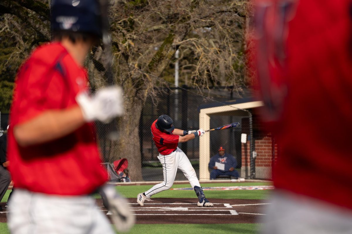 Bear Cubs first baseman J.T. Summers swings during an at bat against West Valley College at home, Wednesday, Feb. 18, 2026.