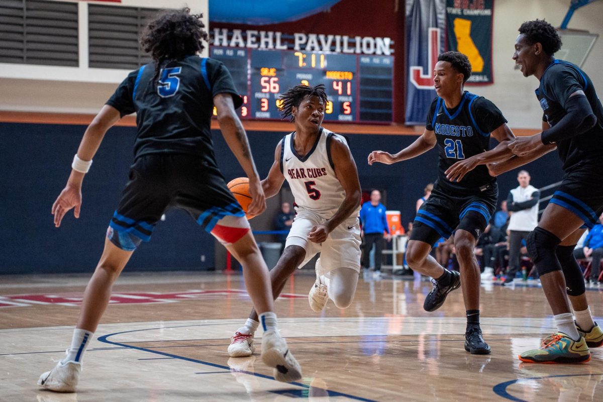 Bear Cubs guard Gavin Cook-Whisenton hits the paint and looks for an opening against Modesto at Haehl Pavilion, Friday, Feb. 17, 2026.