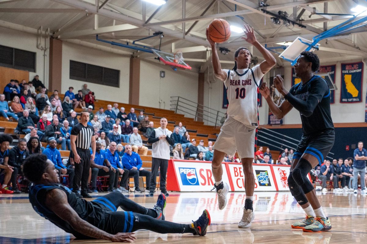 Bear Cubs guard Amari Gray reaches for a field goal against Modesto at Haehl Pavilion, Friday, Feb. 17, 2026.