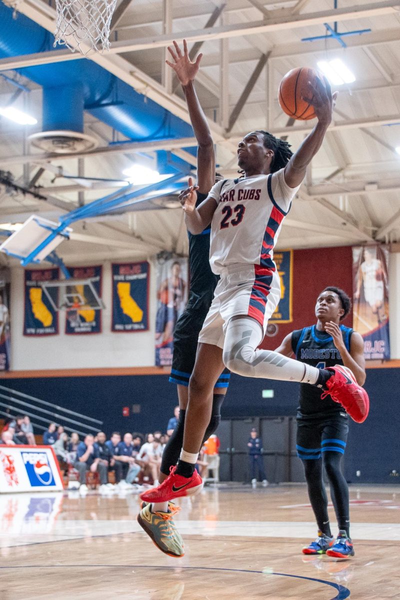 Bear Cubs forward Travis Hightower reaches the skies to score a layup against Modesto at Haehl Pavilion, Friday, Feb. 17, 2026.