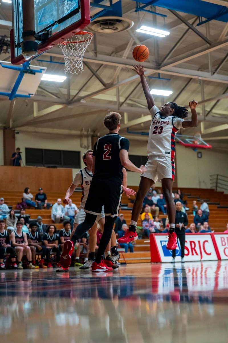 Bear Cubs sophomore forward Travis Hightower goes for a layup, furthering the Bear Cubs' lead against Sierra Feb. 10 at Haehl Pavilion.