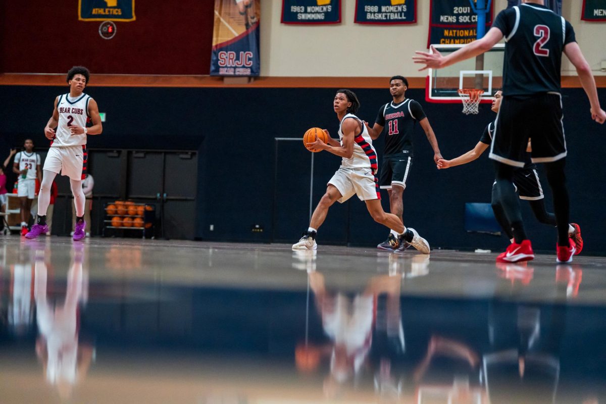 Bear Cubs sophomore guard Amari Gray positions himself to attempt a 3-pointer against Sierra Feb. 10 at Haehl Pavilion.