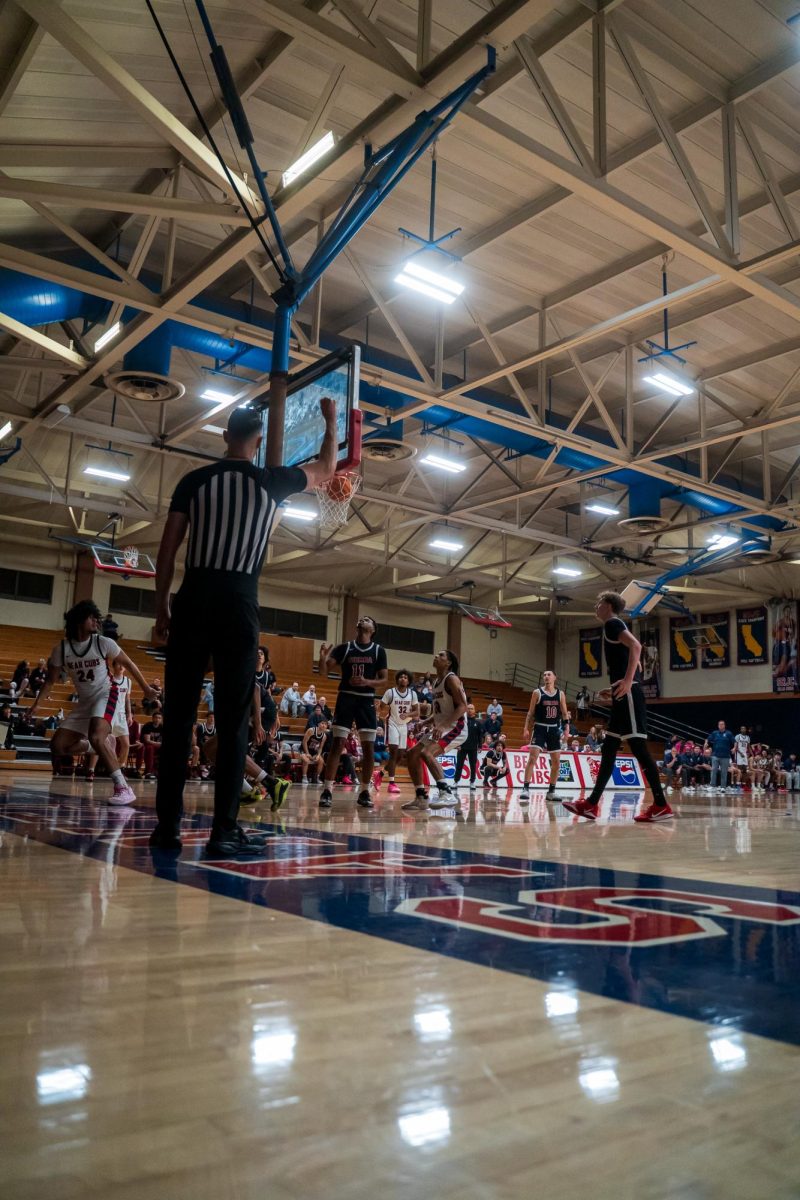 Bear Cubs sophomore forward Vincent Jackson scores through contact and draws a foul on Sierra Feb. 10 at Haehl Pavilion. 
